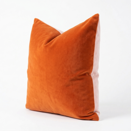 Orange and pink velvet pillow on a white background. Pillow has a zipper to remove cover and can be washed. Insert sold separately. 