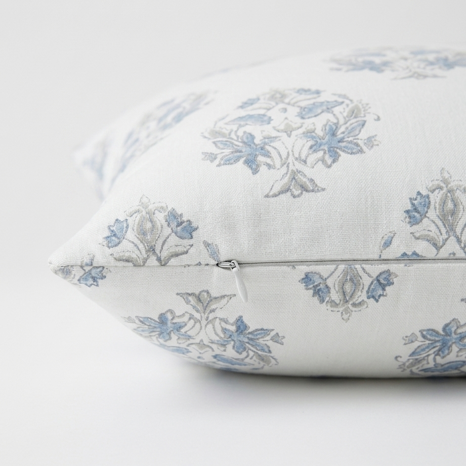 Floral patterned pillow on a white background