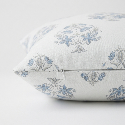 Floral patterned pillow on a white background