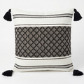 Decorative pillow with black and white pattern and tassels. Removable throw pillow cover 20 x 20.