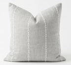 Gray pillow with white chain pattern on a white background