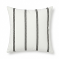 White pillow with black stripes on a white background